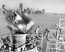 The statue's current replacement torch, added in 1986, is a copper flame covered in 24k gold. 10 Things You Probably Didn T Know About The Statue Of Liberty