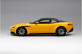 Image result for Sunburst Yellow 2017 Aston Martin