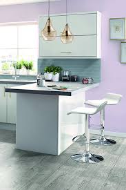 Add Some Unicorn Magic To Your Kitchen By Embracing Pink Walls White Cabinets And Rose Gold Kitche Kitchen Trends White Kitchen Accessories Rose Gold Kitchen