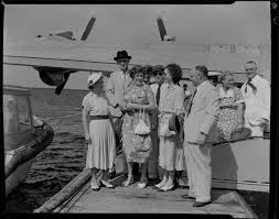 Tasman Empire Airways Ltd, courtesy flight, Governor of Fiji, Sir Leslie  [Brian?] Freeston, Lady Freeston and other embarking passengers, Suva, Fiji 
