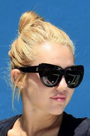 Miley Cyrus Straight Honey Blonde Bun Hairstyle Steal Her Style Miley Cyrus Hair Bun Hairstyles Latest Celebrity Hairstyles