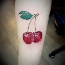 These red edibles have been getting tattooed for decades. The Cherry Tattoo Meaning Facts Photo Pictures Sketches