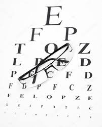 reading glasses with eye chart stock photo ivanko1980