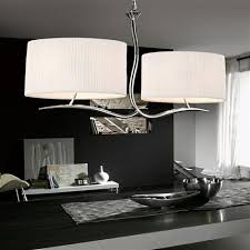 Try our height adjustable pendant lights over kitchen islands and dining tables, or a long drop of clustered hanging lights in stairwells. Eve Twin Arm Ceiling Pendant The Lighting Superstore