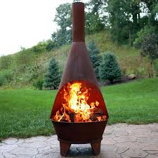 Add an outdoor fire pit that stands out from the rest with this black steel chiminea. Chiminea Tall Novocom Top