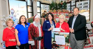 Gingerbread village event at Loma Linda University Children's Hospital  enhanced by community volunteers