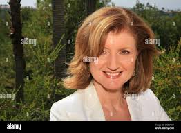 Arianna Huffington, author and editor-in-chief of the Huffington Post,  walks with Colby College President David Greene during the commencement  procession at the Waterville, Maine campus