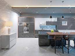 Maybe you would like to learn more about one of these? Modern Kitchen Design With A Long Center Island And Bar Table Stock Photo Picture And Royalty Free Image Image 113849743