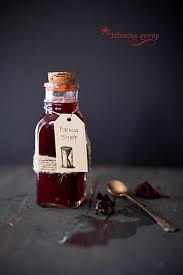 Champagne flute and you have a very pretty drink. Hibiscus Syrup Playful Cooking