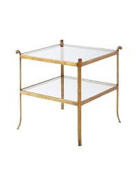 This side table pairs glass and antique brass and is perched on tapering legs for an elegant look. St Germain Square Antique Brass Glass Side Table