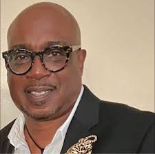 Pimp Nick, dressed for another day at work ( home) thinking