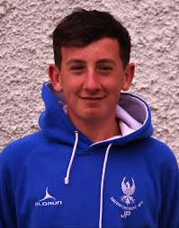 Bill Carne speaks to Jay Power, a regular in Hakin United AFC Under 16  team's 'Triple Triple' success