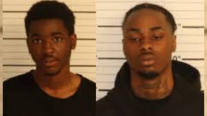 Driver's car riddled with bullets after crash, two arrested