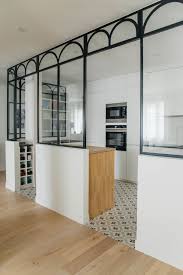 Agence D 39 Architecture D 39 Interieure Et Decoration Situe A Paris France Portfoliobo En 2020 Separation Cuisine Salon Deco Cuisine Moderne Deco Maison Ancienne