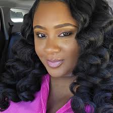 Megan started a journey four years ago to see "how healthy and long" she  could get her natural hair.