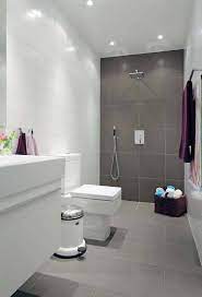 Hopefully, the above information on bathroom design trends for 2021 will help you decide which tiles will look best on your bathroom floor or walls. Small Bathroom Grey And White Bathroom Tile Ideas Trendecors