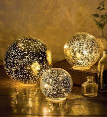Lit, they glow with tiny pinpoints of light, like a starry sky. Glass Ball Lights Set Of 3 Gold Wind And Weather Ball Lights Glass Ball Gold Glass