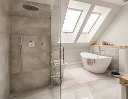 The design is set in taupe and beige. Why You Should Design Your Bathroom With A Rain Shower Infinity Drain
