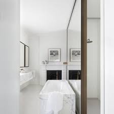 Consider a modern mantel mirror to draw the eye upward, highlighting other decor on the shelf and make the room appear bigger all at once. 8 Gorgeous Small Space Ideas