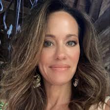 Who specializes in highlights for super dark hair with existing color in  Valparaiso?