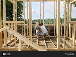 Before staining, it's helpful to set your frame on painter's pyramids to elevate the frame off your surface. Father His Young Son Image Photo Free Trial Bigstock