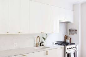 We are thinking of going with the ikea ringhult cabinets in high gloss gray, and a white quartz countertop with some veins of gray, like marble. Ringhult Door