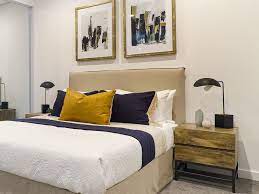 Your bedside tables should not be so low that they look dwarfed by the bed or so high that you have to reach way up to turn on a lamp. Our 3 Best Tips When Choosing A Bedside Table Lamp Let S Revamp Property Styling