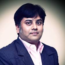 Myself lighting JPF lamp of wisdom with Mr R K Damani, Chairman