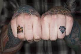 A single dot may signify 'an end'. Outline Crown Finger Tattoo
