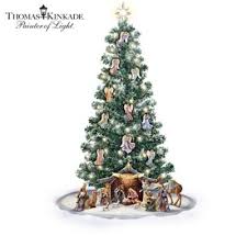 Here you will find starbucks or dunkin' mugs and ornaments, vintage 35mm slides or old photos, a completed needlepoint, playbill, handbag, vintage piece of flatware or dinner plate or that. Thomas Kinkade Blessed Nativity Christmas Tree And Angel Ornament Collection