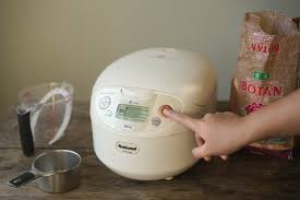 Combine rice and water in a rice cooker. How To Cook Brown Rice In A Rice Cooker Perfect Fluffly Results