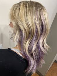 These brown blonde streaks are a great base to use an additional unnatural color, and the light shade of purple (purple haze) is great! Purple Highlights Lowlights Purple Highlights Blonde Hair Hair Streaks Blonde Purple Blonde Hair