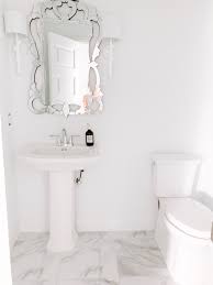 Inspired decor, perfect for farmhouse decor, swap out the wreath with the seasons for a change of style. Modern Farmhouse Powder Bathroom Reveal A Blissful Nest