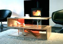 When you walk into a room, front and center is the table. Qubis Haus Dual Purpose Coffee Table And Dollhouse