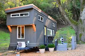 With a house on wheels, home is anywhere you park it — and life on the road is a family affair. Tiny House On Wheels With Entertaining Space 1 Idesignarch Interior Design Architecture Interior Decorating Emagazine