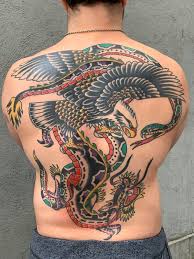 Battle Royale By Bert Krak Done At Smith Street Tattoo In Brooklyn Ny Traditionaltattoos Traditional Back Tattoo Traditional Tattoo Tattoos