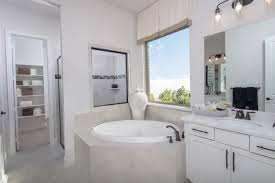 Use a screwdriver to disconnect and remove the tub's waste and overflow valve cover. Bathtub Basics The Pros Cons Of Built In Versus Freestanding Details Matter Second House On The Right