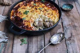 To lighten up one of my favorite family recipes, cheesy potato casserole. Tave Kosi The Must Try Albanian Lamb Yogurt Casserole