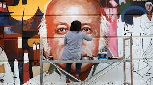 Murals bring 'joy' to Baghdad concrete jungle - Al-Monitor ...