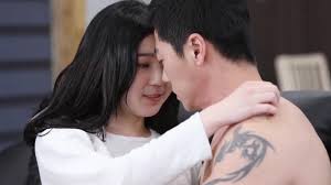 Japanese couple having sex on a couch