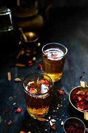 Authentic Kashmiri Tea Kahwa Recipe Kashmiri Tea Kahwah Kehwa Kahwa Tea Benefits Iced Tea Recipes Flavored Drinks Tea Recipes