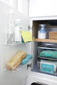 Organizing Under The Laundry Room Sink A Diy Cabinet Door Organizer Diy Cabinet Doors Kitchen Sink Diy Kitchen Sink Organization