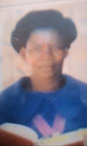 Please can somebody restore this photo of my late mother, it's the only one  I have of her. Thanks