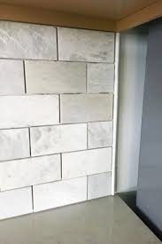 Move appliances out of the way and cover the surrounding area to protect adjacent surfaces. How To Install A Marble Subway Tile Backsplash Abby Lawson