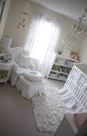 White crib and walls accompany colorful rug and swing seat. 50 Creative Baby Nursery Rugs Ideas Ultimate Home Ideas