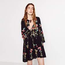 Featuring lining, a ruffled hem and front button fastening. Zara Dresses Zara Embroidered Black Floral Dress Poshmark