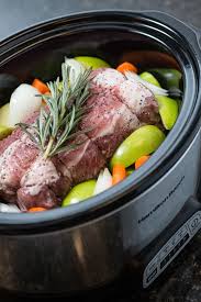 Slow Cooker Pork Roast With Apples Carrots And Rosemary Slow Cooker Pork Roast Pork Loin Recipes Slow Cooker Pork