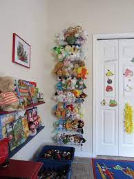 Creating A Well Organized Stuffed Animal Storage Stuffed Animal Storage Organizing Stuffed Animals Kids Room Organization
