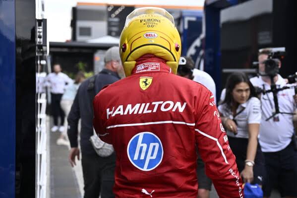 Hamilton says he's 'useless,' suggests driver change at Ferrari | AP News