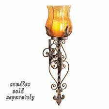 A sconce is a type of fixture that is mounted to a wall. Metal Wall Mounted Candle Sconce With Glass Candle Holder Buy Candle Holder Wall Mounted Candle Holder Metal Candle Holder Product On Alibaba Com